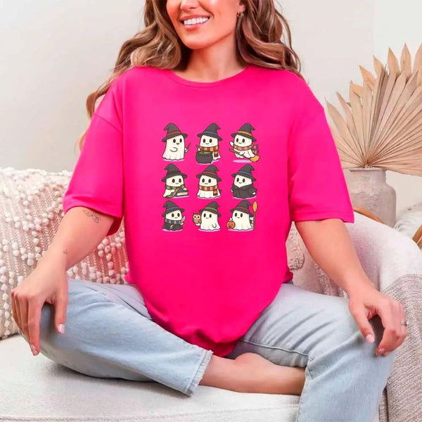 May include a Halloween t-shirt featuring kawaii-style witch ghosts in a spooky-cute design, perfect for fall and Halloween wear.