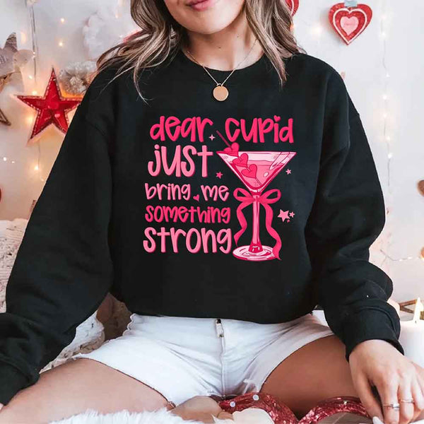 May include a unisex T-shirt with the phrase Dear Cupid Something Strong printed clearly on the front.