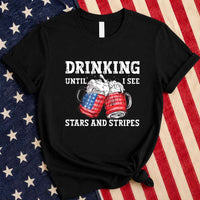 May include Drinking Until I See The Stars And Stripes 4th of July graphic tee with patriotic design and relaxed fit
