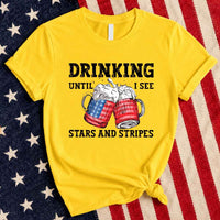 May include Drinking Until I See The Stars And Stripes 4th of July graphic tee with patriotic design and relaxed fit