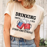 May include Drinking Until I See The Stars And Stripes 4th of July graphic tee with patriotic design and relaxed fit