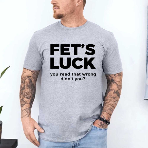 May include a graphic t-shirt featuring the phrase “FET’S LUCK” designed as an optical illusion.
