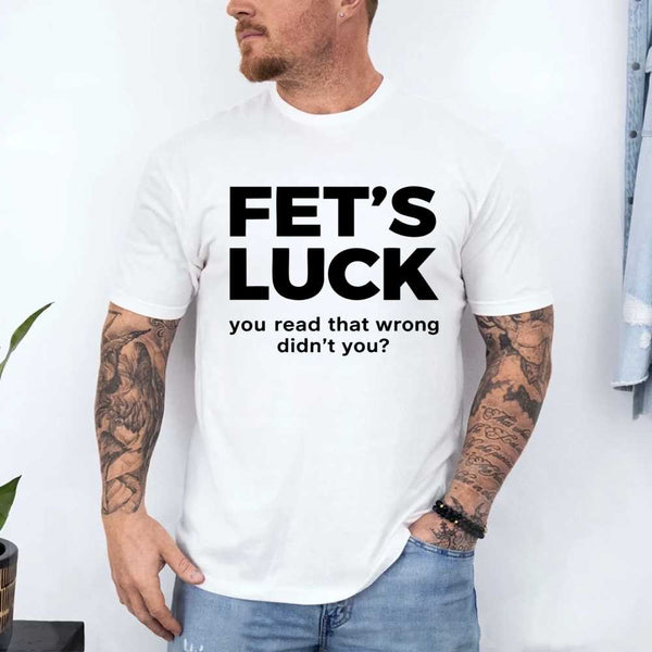 May include a graphic t-shirt featuring the phrase “FET’S LUCK” designed as an optical illusion.