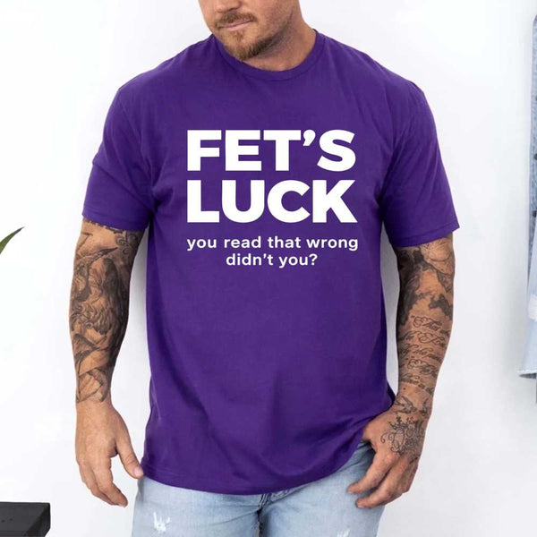 May include a graphic t-shirt featuring the phrase “FET’S LUCK” designed as an optical illusion.