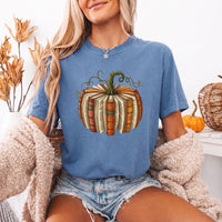 May include a Fall Book Pumpkin Comfort Colors T-Shirt featuring a book and pumpkin design, perfect for readers, book lovers, autumn outfits, and cozy fall gatherings.