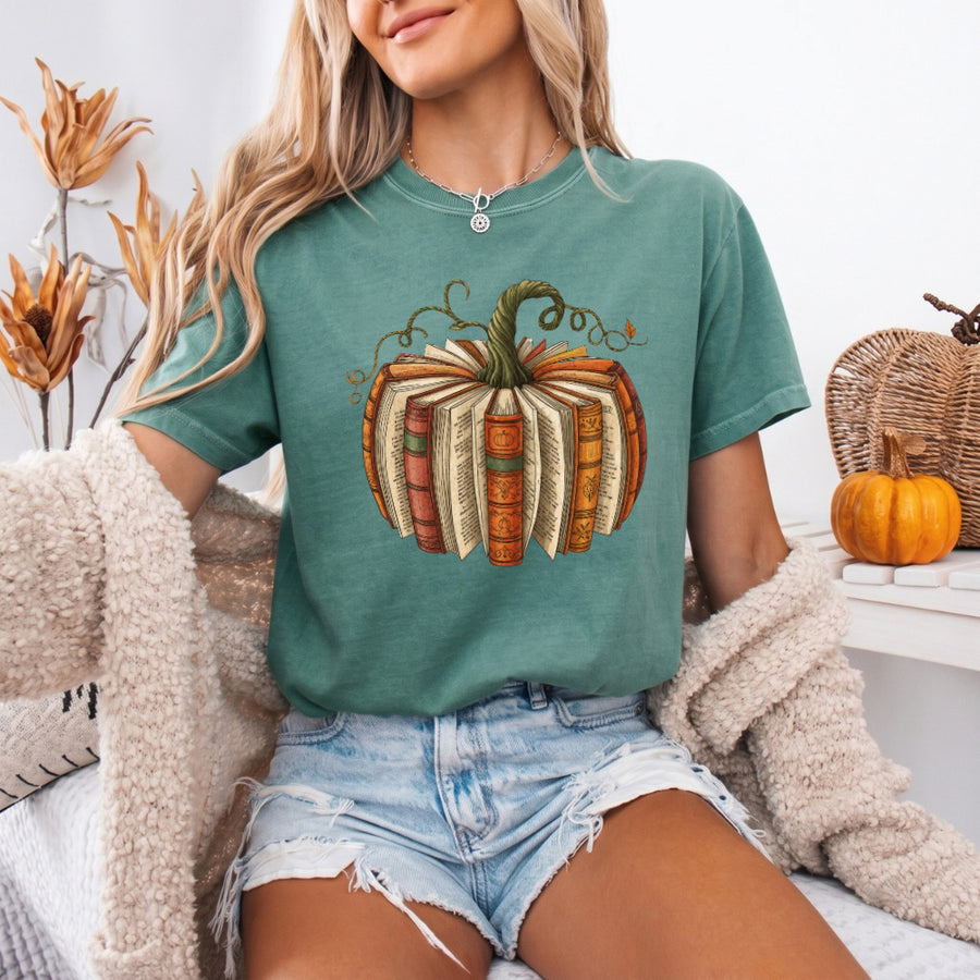 May include a Fall Book Pumpkin Comfort Colors T-Shirt featuring a book and pumpkin design, perfect for readers, book lovers, autumn outfits, and cozy fall gatherings.