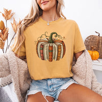 May include a Fall Book Pumpkin Comfort Colors T-Shirt featuring a book and pumpkin design, perfect for readers, book lovers, autumn outfits, and cozy fall gatherings.