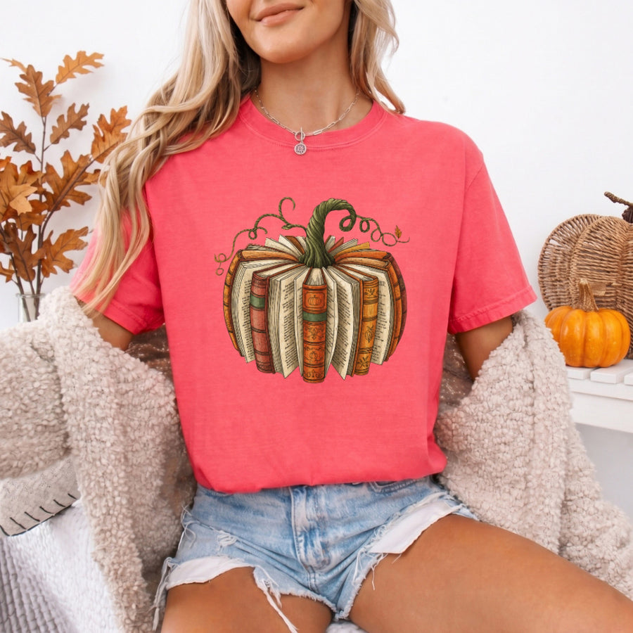 May include a Fall Book Pumpkin Comfort Colors T-Shirt featuring a book and pumpkin design, perfect for readers, book lovers, autumn outfits, and cozy fall gatherings.