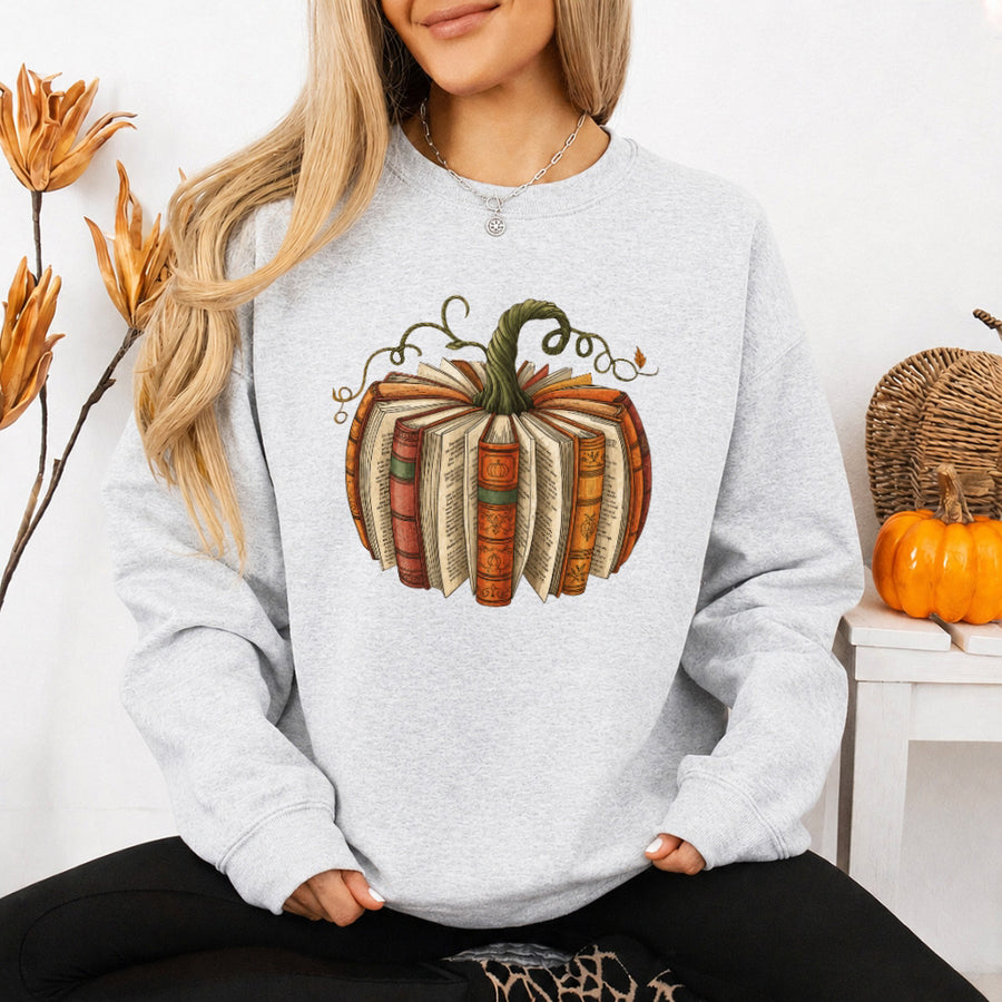 May include Fall Book Pumpkin sweatshirt with cozy book and pumpkin graphic, classic unisex crewneck, and soft fleece fabric