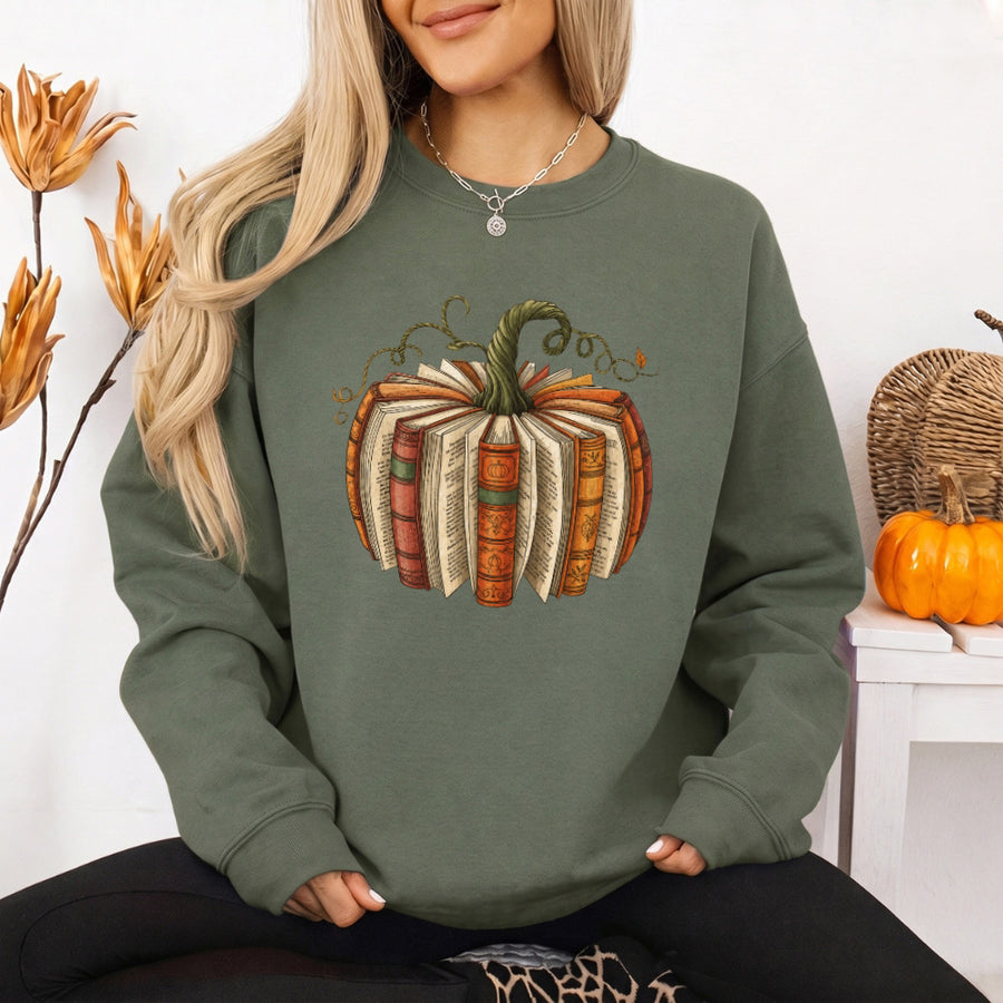 May include Fall Book Pumpkin sweatshirt with cozy book and pumpkin graphic, classic unisex crewneck, and soft fleece fabric