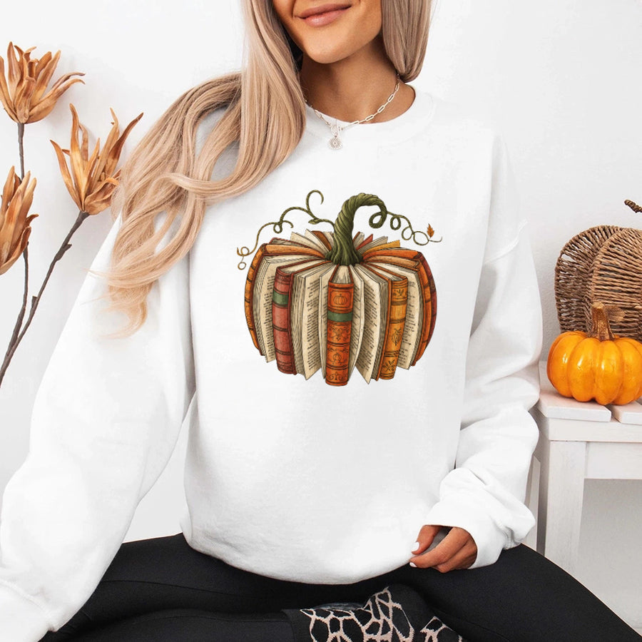 May include Fall Book Pumpkin sweatshirt with cozy book and pumpkin graphic, classic unisex crewneck, and soft fleece fabric