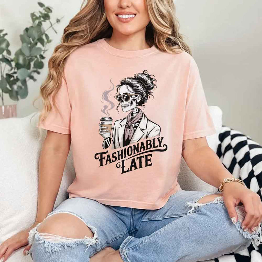 May include a unisex short sleeve T-shirt with “Fashionably Late” funny graphic text printed on the front.