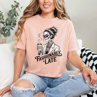 May include a unisex short sleeve T-shirt with “Fashionably Late” funny graphic text printed on the front.