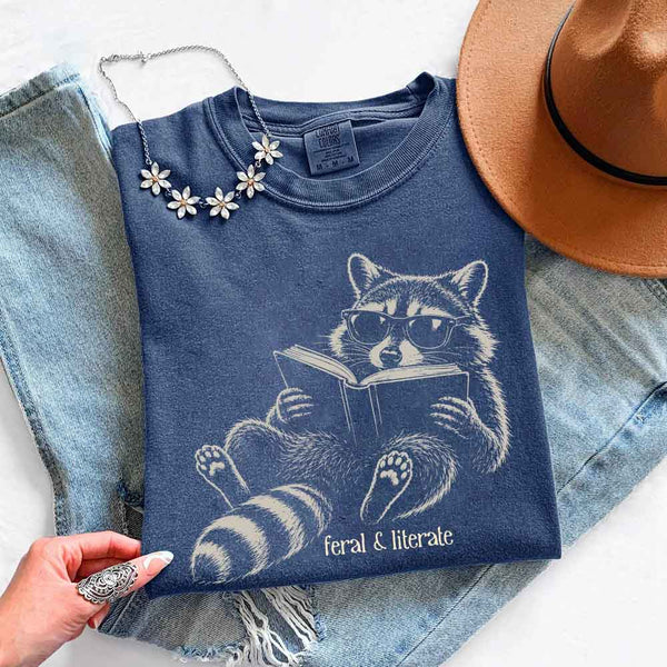 May include Feral & Literate Comfort Colors t-shirt with funny book lover graphic, relaxed unisex fit, and garment-dyed cotton