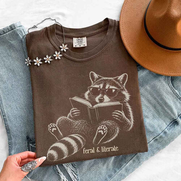 May include Feral & Literate Comfort Colors t-shirt with funny book lover graphic, relaxed unisex fit, and garment-dyed cotton