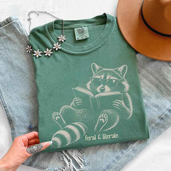 May include Feral & Literate Comfort Colors t-shirt with funny book lover graphic, relaxed unisex fit, and garment-dyed cotton