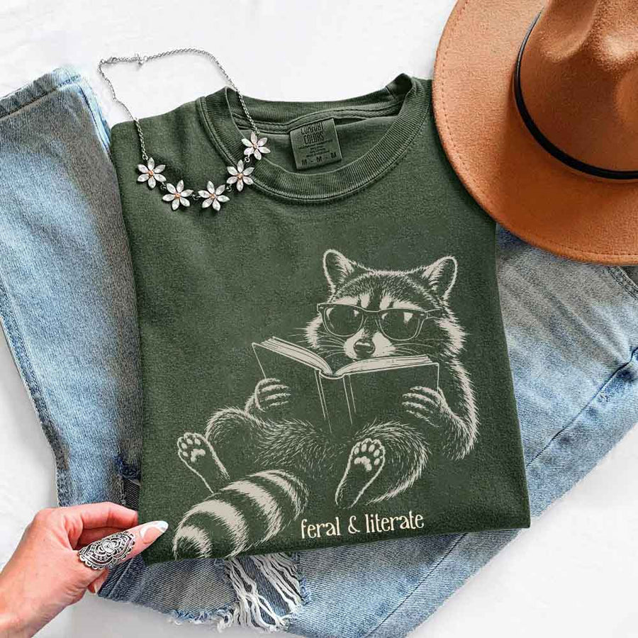 May include Feral & Literate Comfort Colors t-shirt with funny book lover graphic, relaxed unisex fit, and garment-dyed cotton