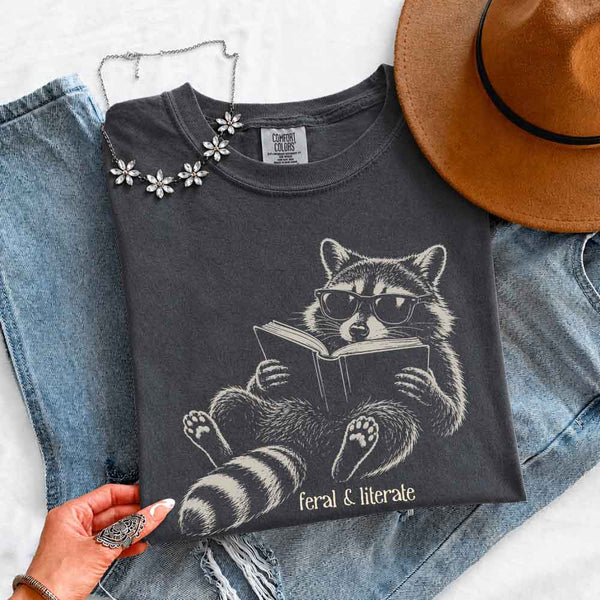 May include Feral & Literate Comfort Colors t-shirt with funny book lover graphic, relaxed unisex fit, and garment-dyed cotton
