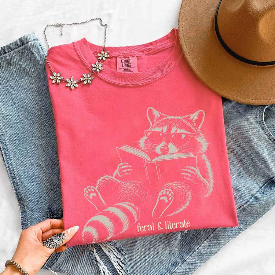 May include Feral & Literate Comfort Colors t-shirt with funny book lover graphic, relaxed unisex fit, and garment-dyed cotton