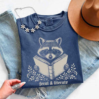 May include Feral & Literate Raccoon Comfort Colors t-shirt with funny book lover graphic, relaxed unisex fit, and garment-dyed cotton