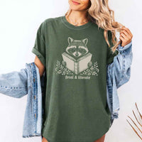 May include Feral & Literate Raccoon Comfort Colors t-shirt with funny book lover graphic, relaxed unisex fit, and garment-dyed cotton