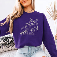 May include a Feral & Literate Raccoon Sweatshirt featuring a playful raccoon illustration and witty book lover statement design.
