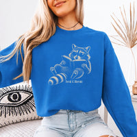 May include a Feral & Literate Raccoon Sweatshirt featuring a playful raccoon illustration and witty book lover statement design.