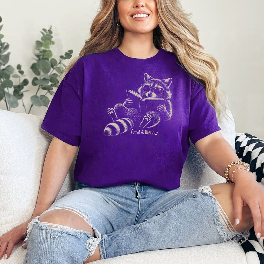 May include Feral & Literate Raccoon unisex t-shirt with funny book lover graphic, classic crew neck, and soft cotton fabric