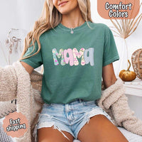May include the word “Mama” in large playful letters, each filled with different pastel floral, gingham, bow, and striped patterns, creating a sweet and charming patchwork design perfect for moms.