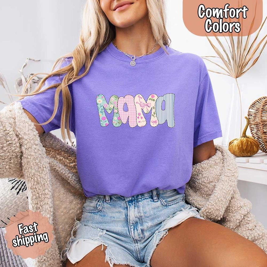May include the word “Mama” in large playful letters, each filled with different pastel floral, gingham, bow, and striped patterns, creating a sweet and charming patchwork design perfect for moms.