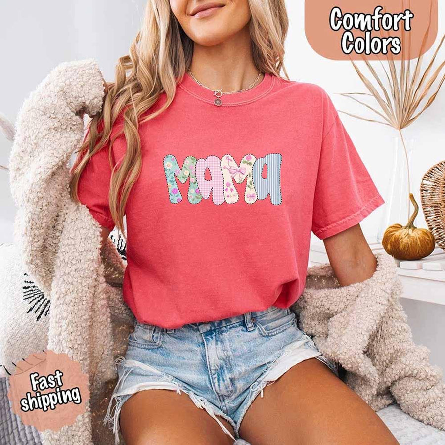 May include the word “Mama” in large playful letters, each filled with different pastel floral, gingham, bow, and striped patterns, creating a sweet and charming patchwork design perfect for moms.