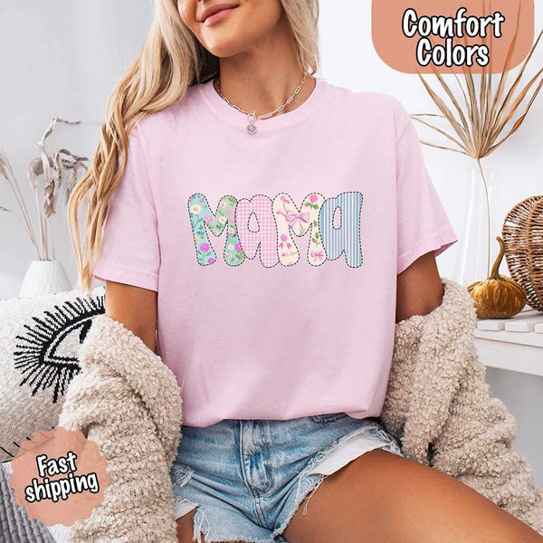May include the word “Mama” in large playful letters, each filled with different pastel floral, gingham, bow, and striped patterns, creating a sweet and charming patchwork design perfect for moms.