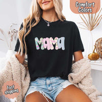 May include the word “Mama” in large playful letters, each filled with different pastel floral, gingham, bow, and striped patterns, creating a sweet and charming patchwork design perfect for moms.
