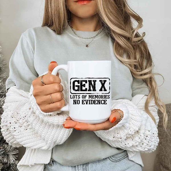 Person holding a mug with 'GEN X: Lots of memories, No evidence' text