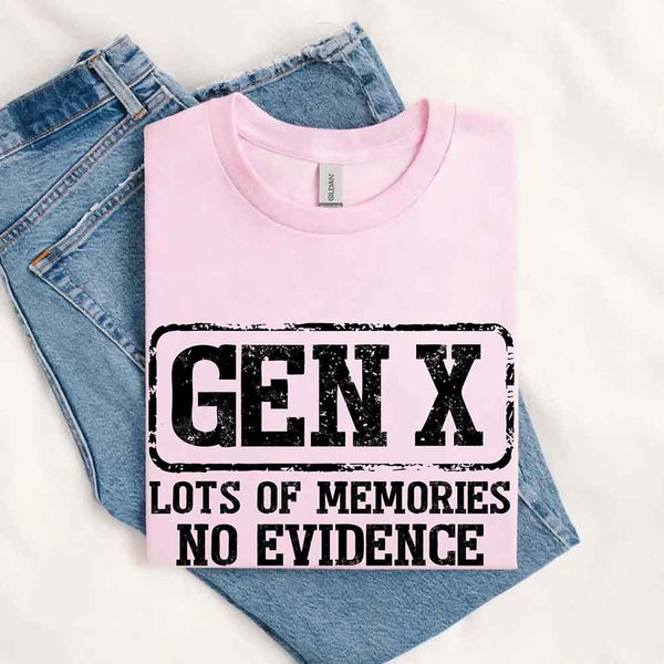 May include a t-shirt design with bold black text that reads “GEN X” in a distressed block style, followed by the phrase “LOTS OF MEMORIES NO EVIDENCE” in uppercase letters beneath it. The layout has a vintage, stamped look with a humorous nostalgic tone.