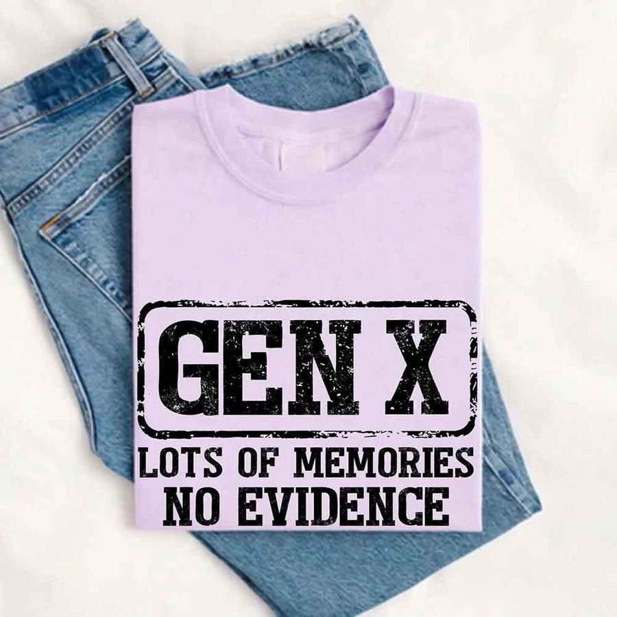 May include a t-shirt design with bold black text that reads “GEN X” in a distressed block style, followed by the phrase “LOTS OF MEMORIES NO EVIDENCE” in uppercase letters beneath it. The layout has a vintage, stamped look with a humorous nostalgic tone.