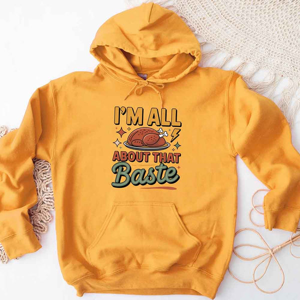Yellow hoodie with text and graphic design on a white background