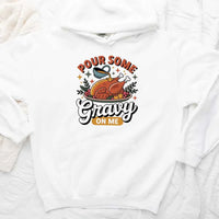 White sweatshirt with a graphic design of a roasted turkey and text 'Pour Some Gravy on Me' on a white background.