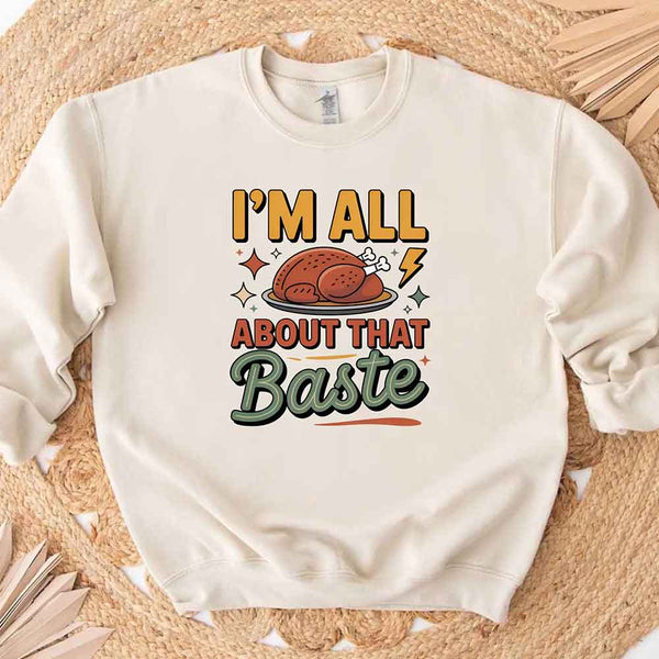 White sweatshirt with a graphic design and text on a woven mat background