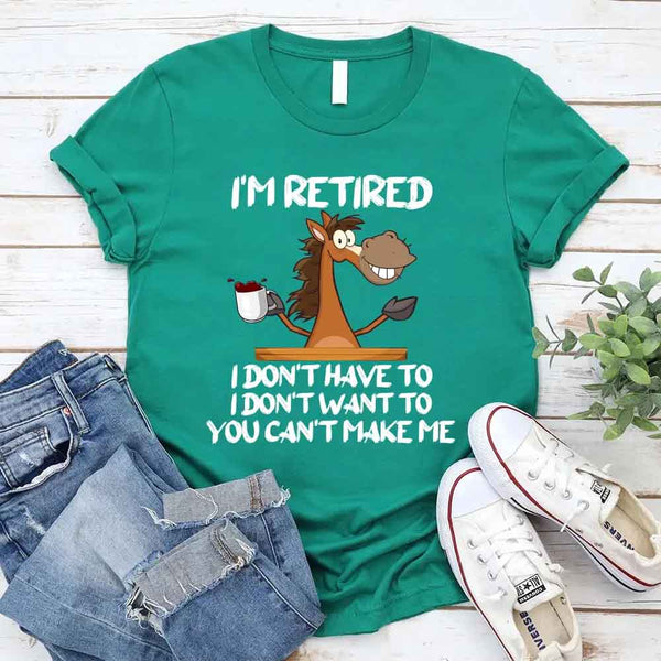 May include a graphic tee with the phrase “I Am Retired I Don’t Have To” printed in a bold, humorous style, featuring clean lettering on a casual shirt meant to highlight a playful retirement message.