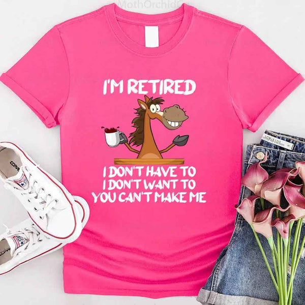 May include a graphic tee with the phrase “I Am Retired I Don’t Have To” printed in a bold, humorous style, featuring clean lettering on a casual shirt meant to highlight a playful retirement message.