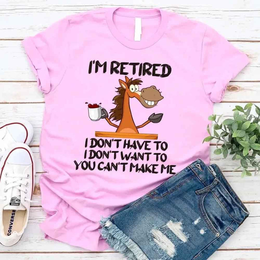 May include a graphic tee with the phrase “I Am Retired I Don’t Have To” printed in a bold, humorous style, featuring clean lettering on a casual shirt meant to highlight a playful retirement message.