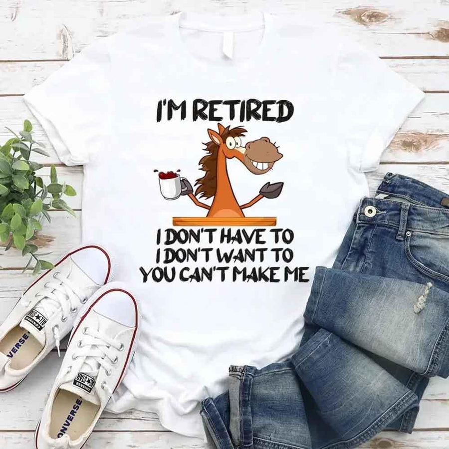 May include a graphic tee with the phrase “I Am Retired I Don’t Have To” printed in a bold, humorous style, featuring clean lettering on a casual shirt meant to highlight a playful retirement message.