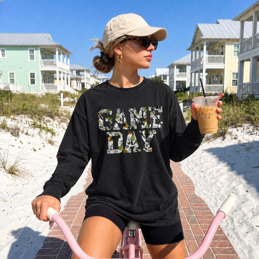 May include a Game Day Camo Print Comfort Colors Unisex Long Sleeve featuring a football-inspired camo print design.