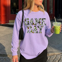 May include a Game Day Camo Print Comfort Colors Unisex Long Sleeve featuring a football-inspired camo print design.