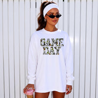 May include a Game Day Camo Print Comfort Colors Unisex Long Sleeve featuring a football-inspired camo print design.