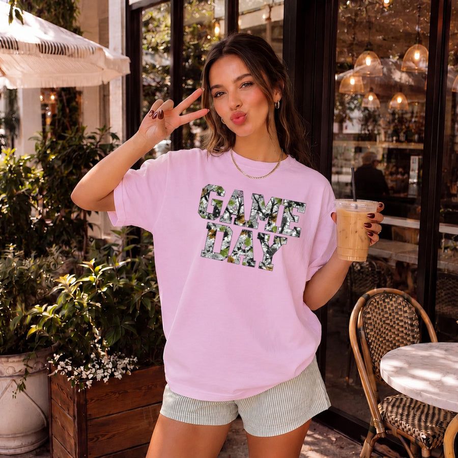 May include a Game Day Comfort Colors Camo Print Football Season Tee featuring a bold camo-inspired game day design.