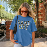 May include a Game Day Comfort Colors Camo Print Football Season Tee featuring a bold camo-inspired game day design.