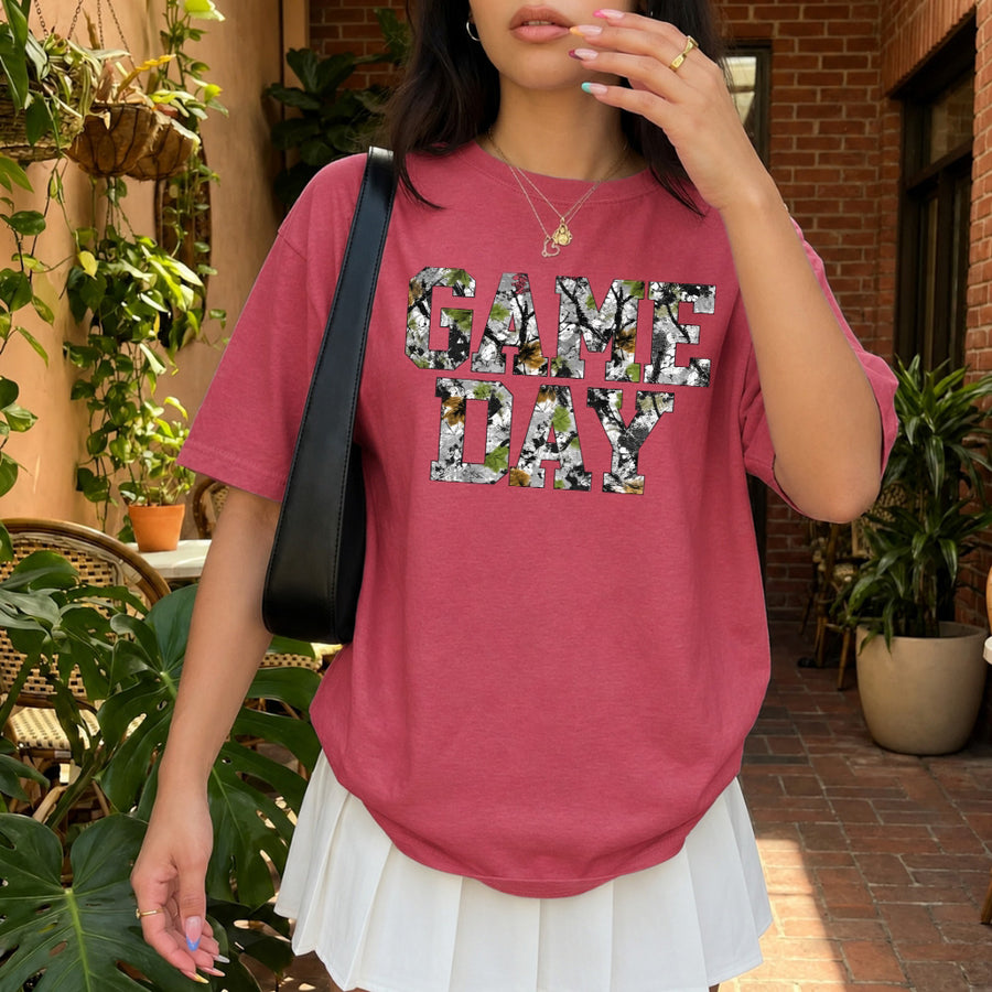 May include a Game Day Comfort Colors Camo Print Football Season Tee featuring a bold camo-inspired game day design.