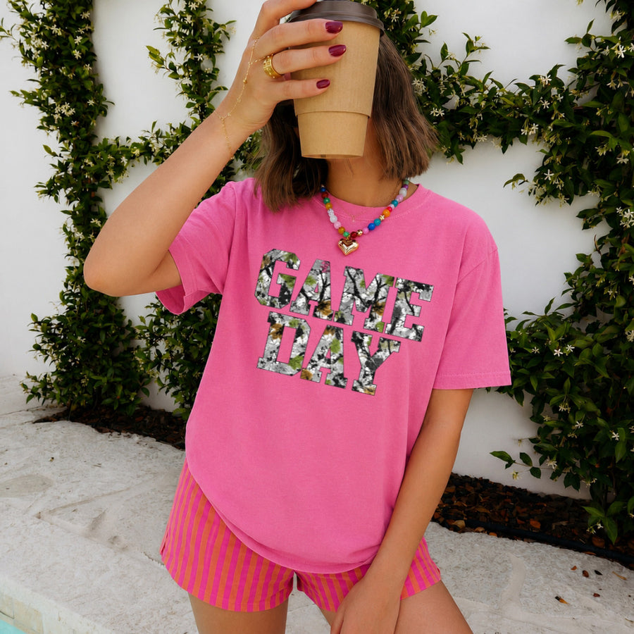 May include a Game Day Comfort Colors Camo Print Football Season Tee featuring a bold camo-inspired game day design.